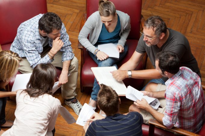 Team members reviewing team agreements together